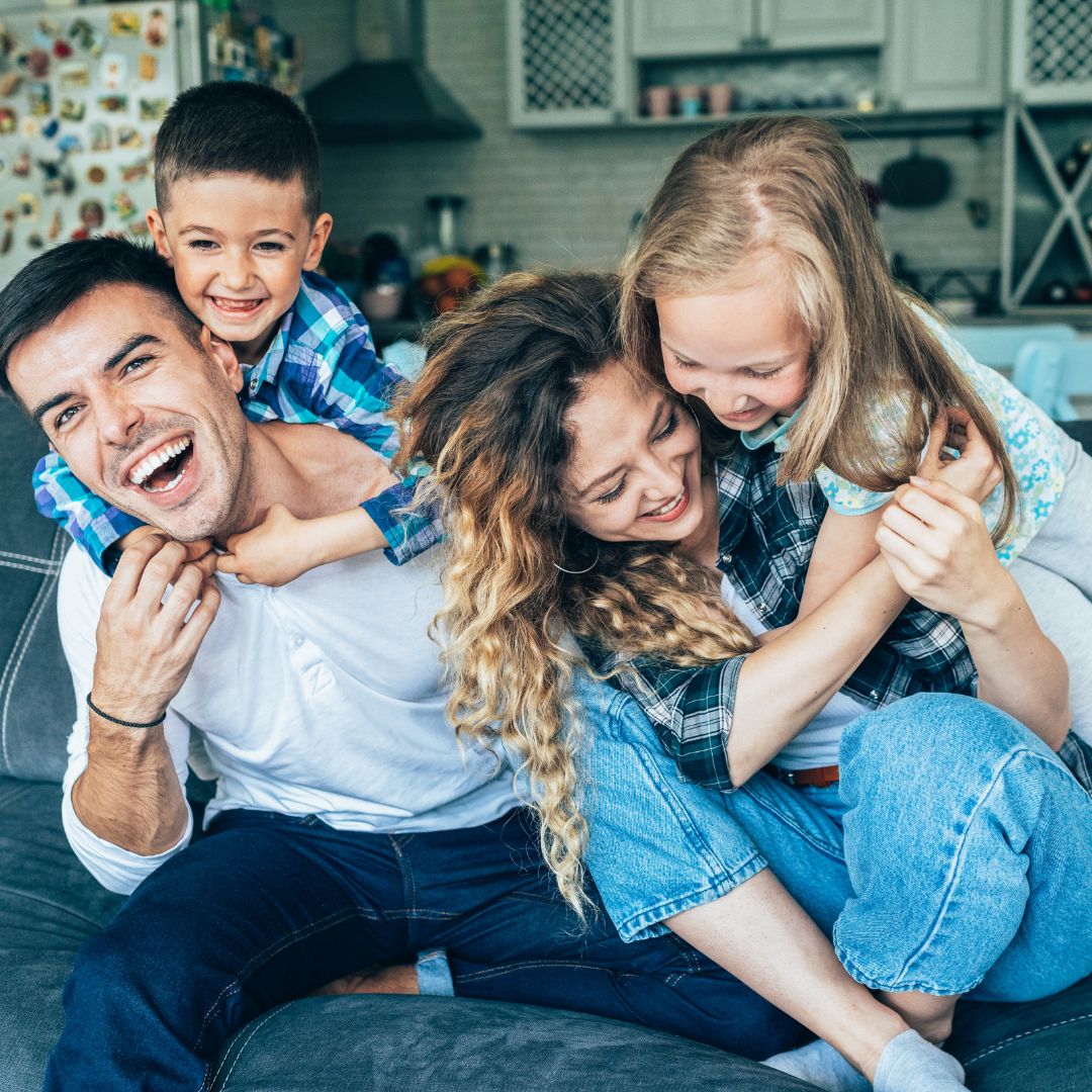 %Title% | Divine happy family on a couch