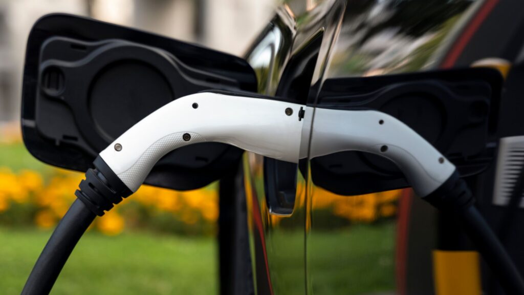EV charger plugged into electric vehicle