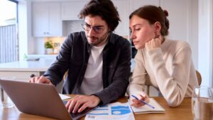 %Focuskw% | Divine Two people reviewing their water bill