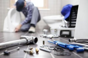 %Focuskw% | Divine plumber at work in a bathroom, plumbing repair service, assemble and install concept