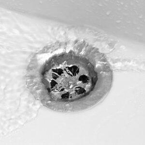 %Focuskw% | Divine Water going down a drain