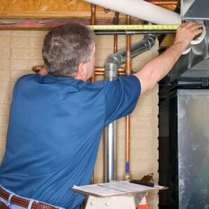 %Title% | Divine An inspector looking at plumbing